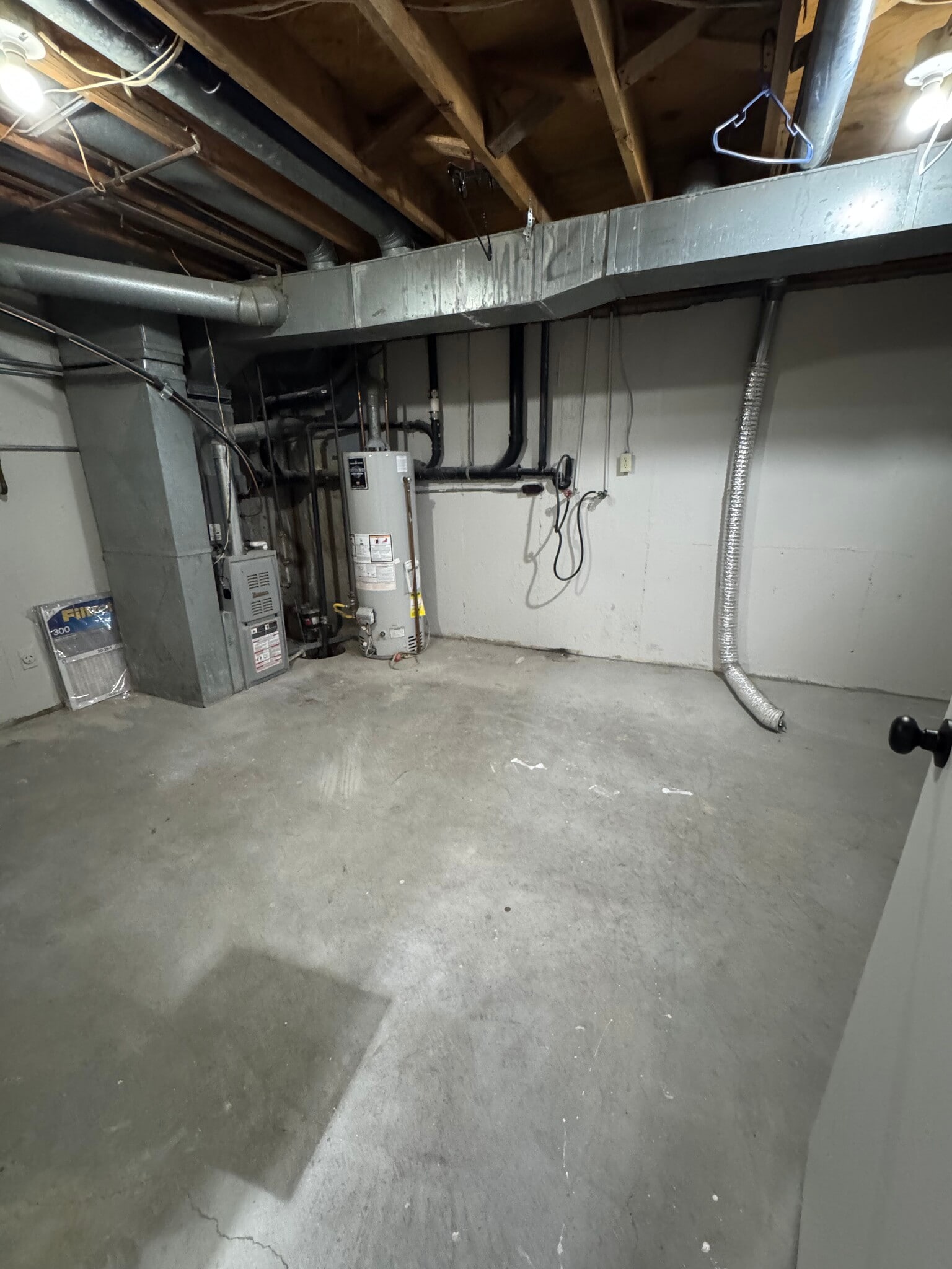 Utility room in basement with washer/dryer hook ups - 7725 W Nantucket St