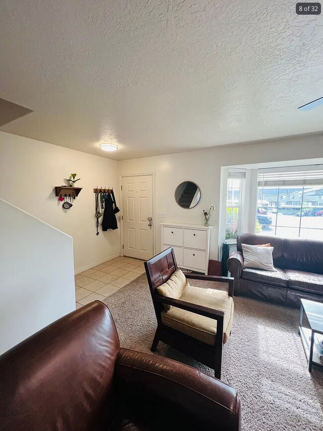 Building Photo - Spacious End-Row Townhome