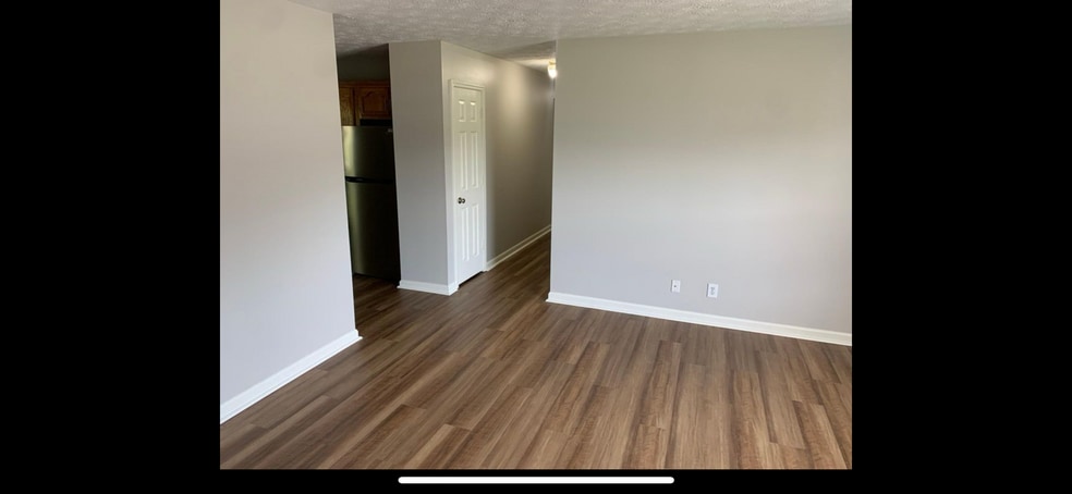 Living room, view to hallway to bedrooms - 414 Blake Cir