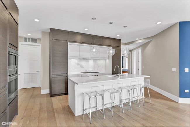 Large island for cooking and entertaining. - 1157 W Erie St