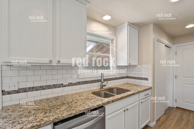Building Photo - 2211 E 49th Ave