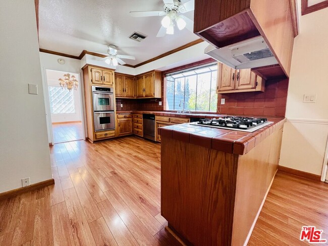 Building Photo - 6124 Corbin Ave