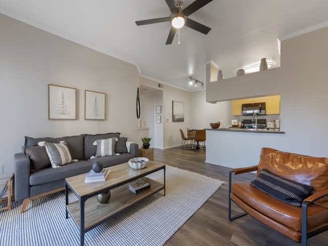 Living Room with Ceiling Fan - Indigo Creek Apartments