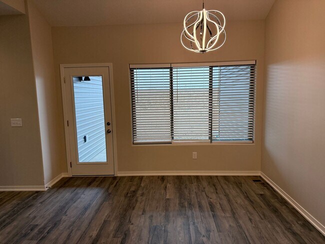 Building Photo - Beautiful brand-new ranch townhome with 2 stall garage. Spacious 3 bedrooms/3 full bathrooms