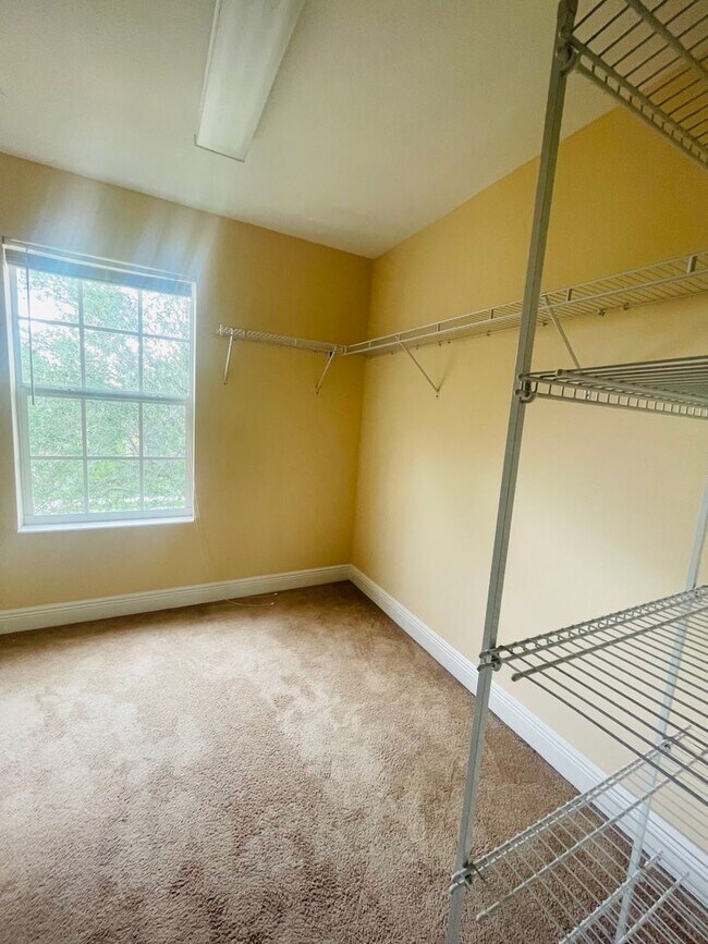 Building Photo - **SUNCOAST LAKES GATED COMMUNITY**