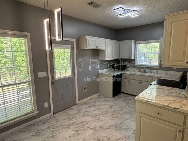 Building Photo - 6272 Deerwood Dr