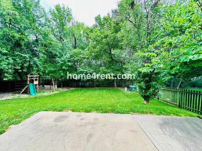 Building Photo - Beautiful Four-Bedroom Home with Three Car Garage, Wood Floors, Finished Basement and a Fenced Ya...