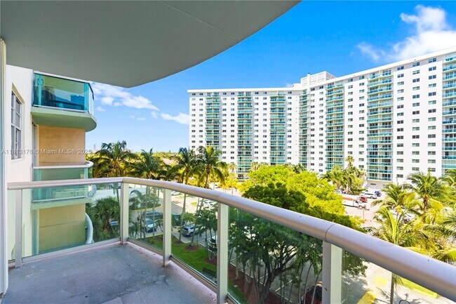 Building Photo - 19390 Collins Ave
