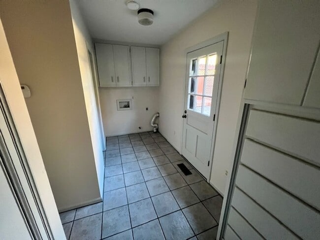 Building Photo - Step into this inviting, sunlit home where space and comfort blend seamlessly