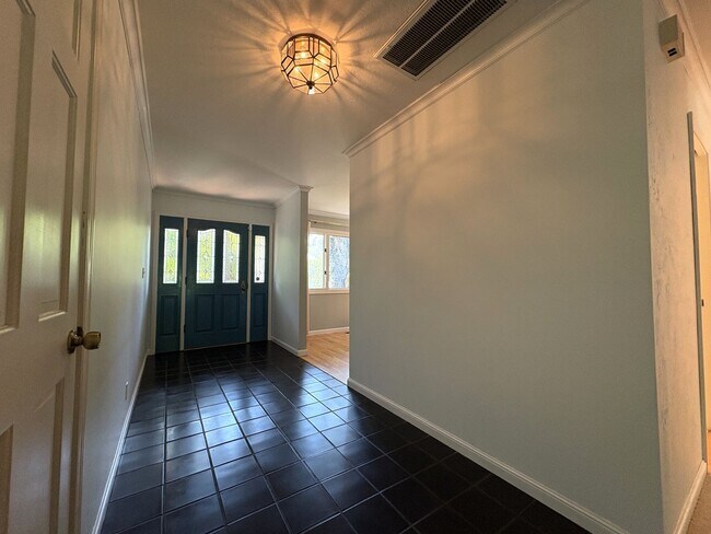 Building Photo - Beautiful Serene 4-Bedroom Home on a Gated...
