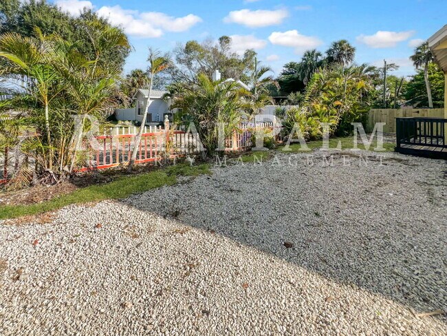 Building Photo - Deck the halls or the French doors, because this charming century-old single family home is avail...