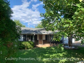 Building Photo - Price Reduced! Spacious House with Landsca...