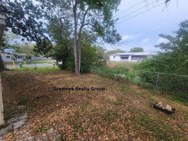 Building Photo - Spacious 3 bed, 2 bath home with fenced yard, screened porch, and oversized garage just minutes f...