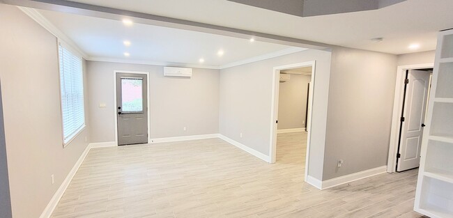 Building Photo - Stylish Basement Rental with Private Ameni...