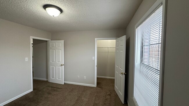 Second bedroom has a walk-in closet. - 1211 Goldridge Dr SW