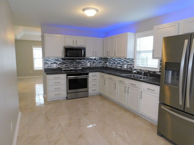 Building Photo - New 3 Bedroom 2 bath