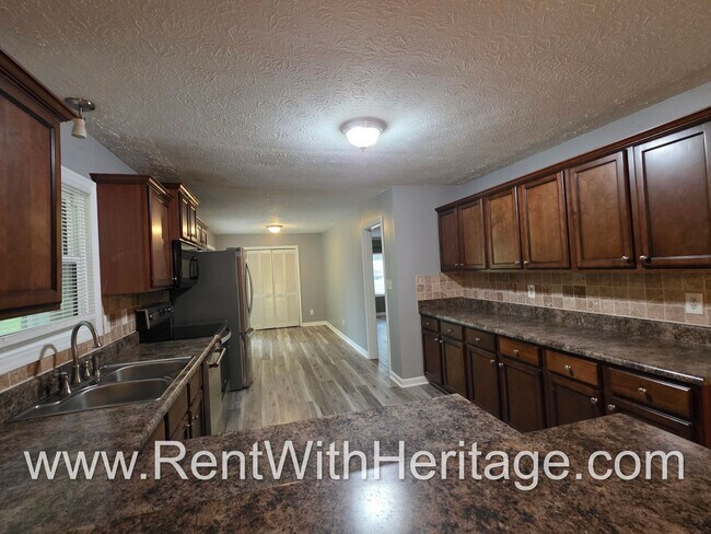 Building Photo - Gorgeous 4 Sided Brick Home/ Upgrades Galore/ Full Unfinished Basement