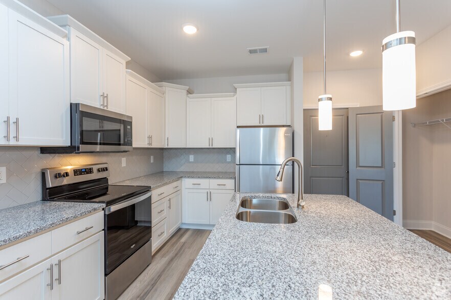 2BR, 2BA - 1081SF Osprey - Kitchen - Palisades at Lewis Creek