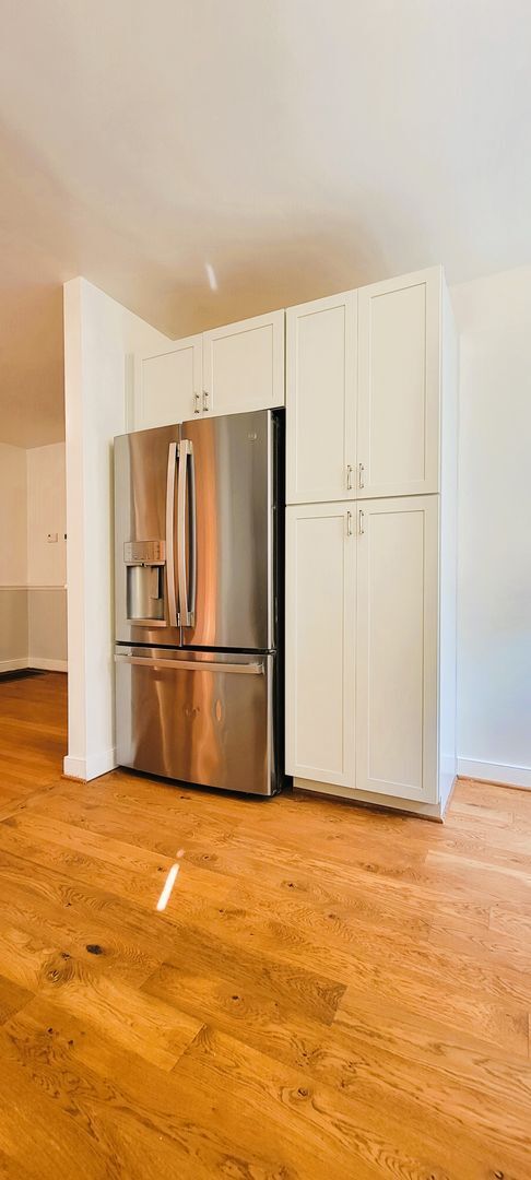 Building Photo - Remodeled brick bungalow with 1st floor li...