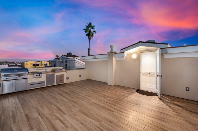 Building Photo - "Coastal Tommy Bahama at 208 East Balboa: Fully Furnished 3-Bed Sanctuary with Rooftop Deck