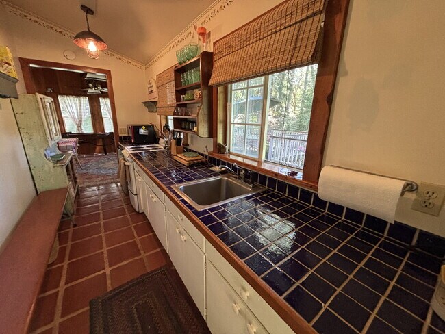 Building Photo - Unique fully furnished 1-2 bedroom property secluded on Newtown Road ten minutes from Placerville!