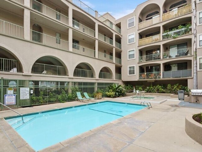 Building Photo - Step into luxury living with this exquisite 2 bedroom 2 bath 3rd floor condo at Emerald Villas