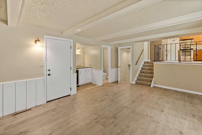 Building Photo - 3-Bedroom with A Flex Room Multi-Level Home with Fresh Paint, Refreshed Deck, and Multiple Living...