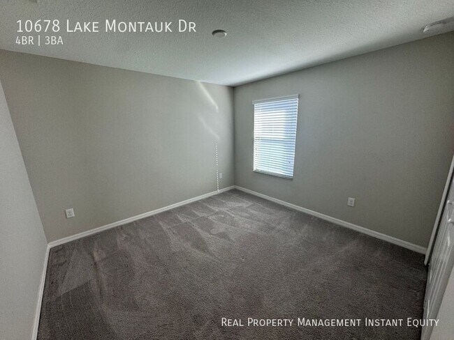 Building Photo - 10678 Lake Montauk Dr