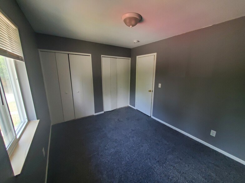 Upstairs bedroom with his and her closets - 5906 Christie Ave SE