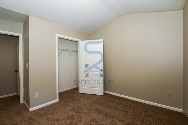 Building Photo - Move in before January 31st and choose your reward: a $250 Amazon Gift Card or a 55" Smart TV!