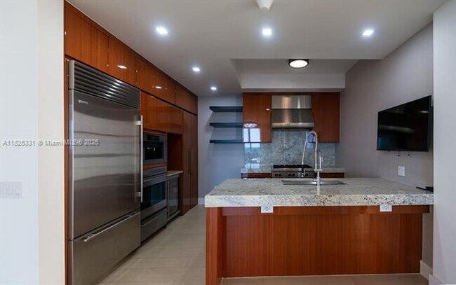 Building Photo - 9701 Collins Ave