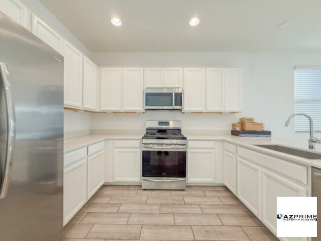 Building Photo - Discover the Essence of Comfort and Style in this Remarkable 4/3 Queen Creek Home!