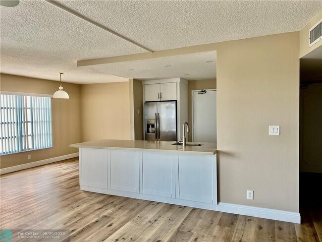 Building Photo - 10777 W Sample Rd