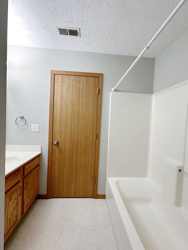 Building Photo - STUNNING Pond Views in this 2-Bed, 2-Bath Duplex