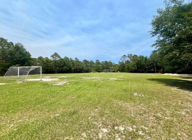 Building Photo - 129 Raintree Blvd