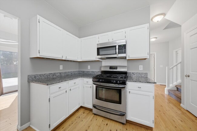 Building Photo - Updated Two-Story with Granite Kitchen, Deck, and Fully Fenced Yard
