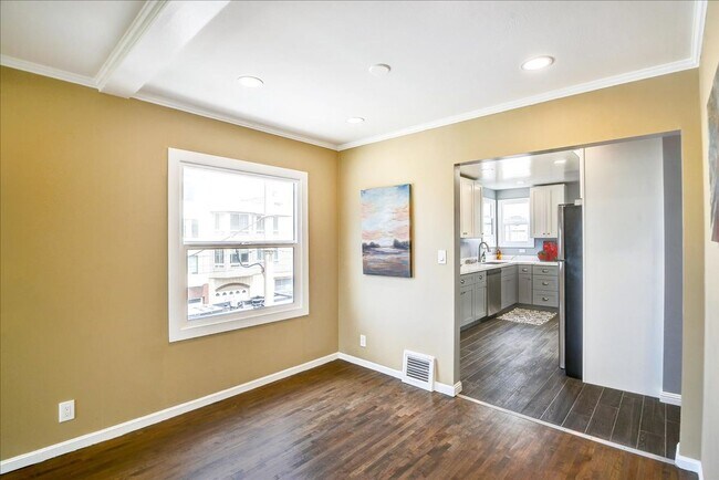 Building Photo - 1400-1402-1402 48th Ave