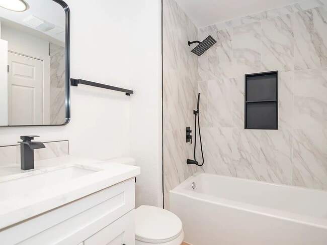 Building Photo - "Charming 5-Bed Sanctuary with Cozy Fireplace on South Rogers Street!"