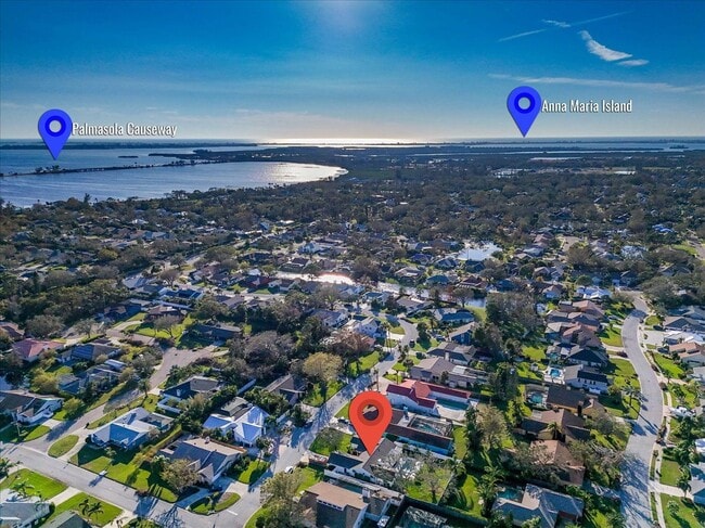 Building Photo - 5BR New Pool 10 min from Beach Fully Furnished