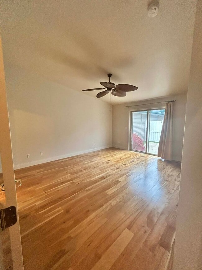 Building Photo - Spacious Duplex with 3-Car Garage & Private Patio!