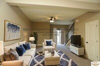 Building Photo - Modern Townhome with Designer Kitchen and High-End Touches in Raymore!