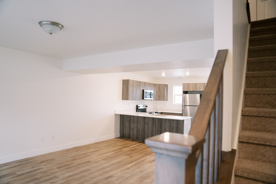 Kitchen / Living Room view from the stairs - 1683 E 1425 S