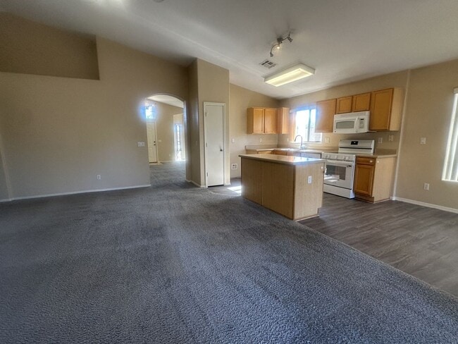 Building Photo - Rare single-level home offers 5 bedrooms and a versatile floor plan designed for comfortable living