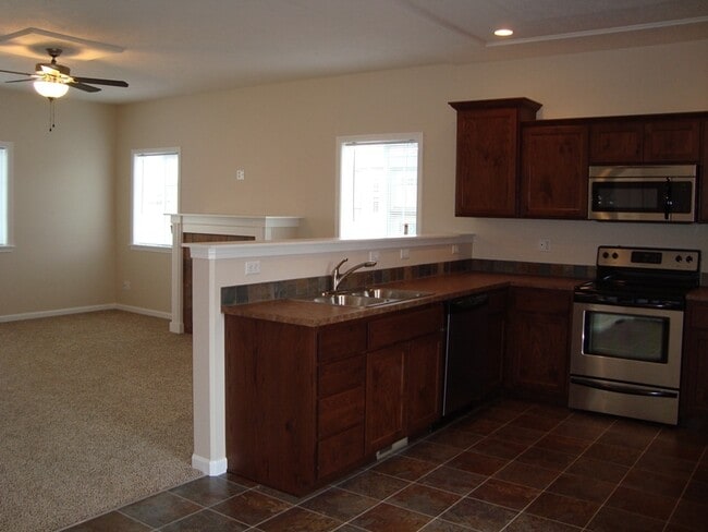 Building Photo - Pet Friendly Single Family Home w/attached garage and RV Parking