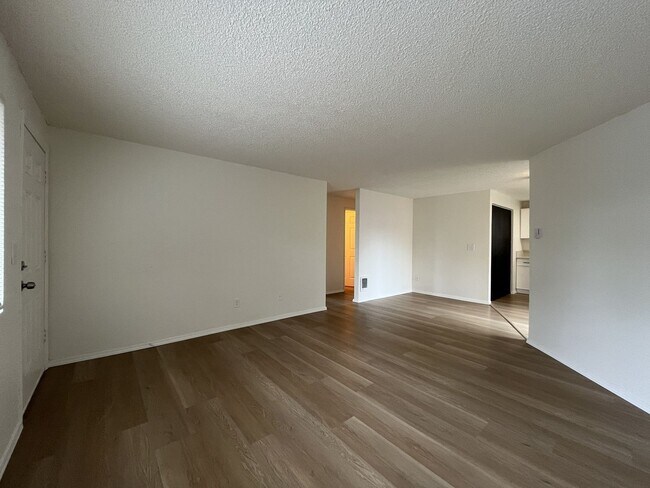 Building Photo - Inviting 2 Bedroom Home with Open Layout, Stainless Steel Appliances & Private Outdoor Retreat