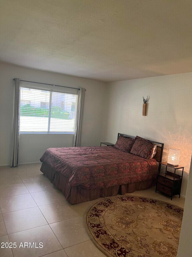 Building Photo - 7950 E Camelback Rd