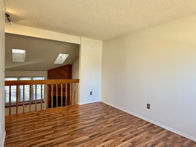Building Photo - Open Tri-Level Townhome With Tons Of Space...
