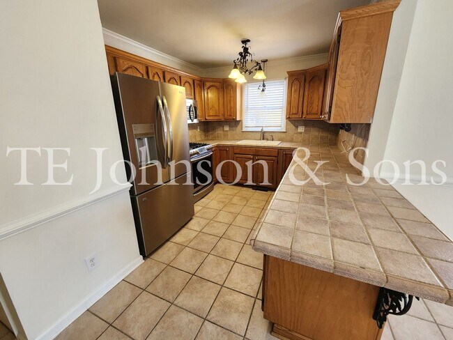 Primary Photo - Charming 3-Bedroom Home with Rocking Chair...