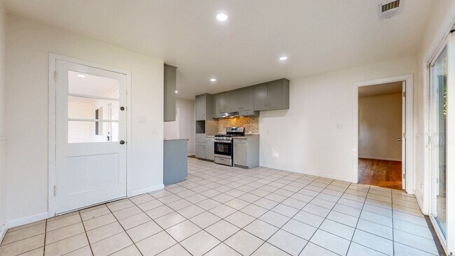 Building Photo - Bright & Clean Single Level FIVE bedroom i...