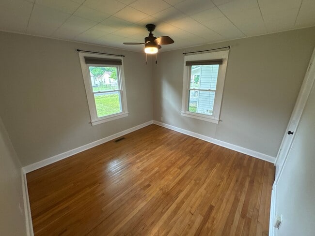 Building Photo - Classic charm meets modern comfort in this updated Madison cottage with a large backyard and conv...